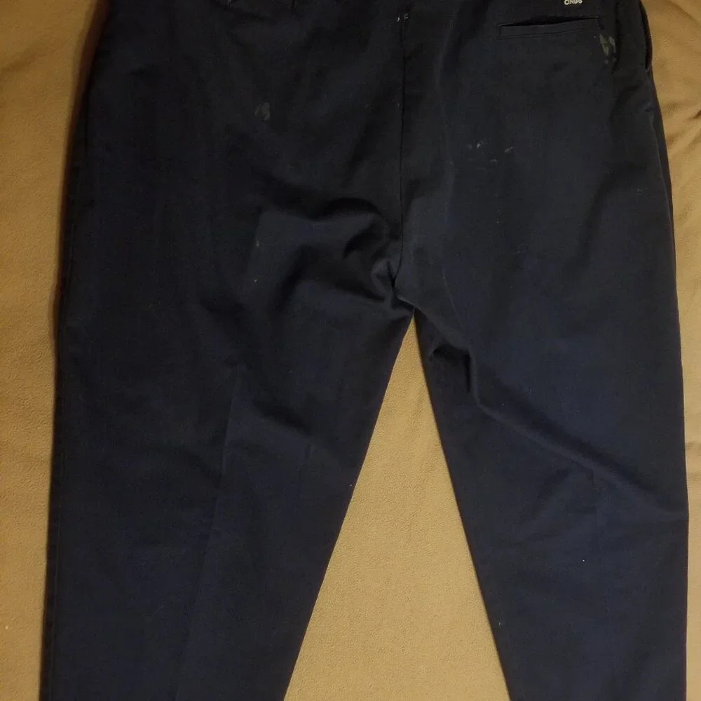 Three stained Cintas men's pants with stretching waistbands